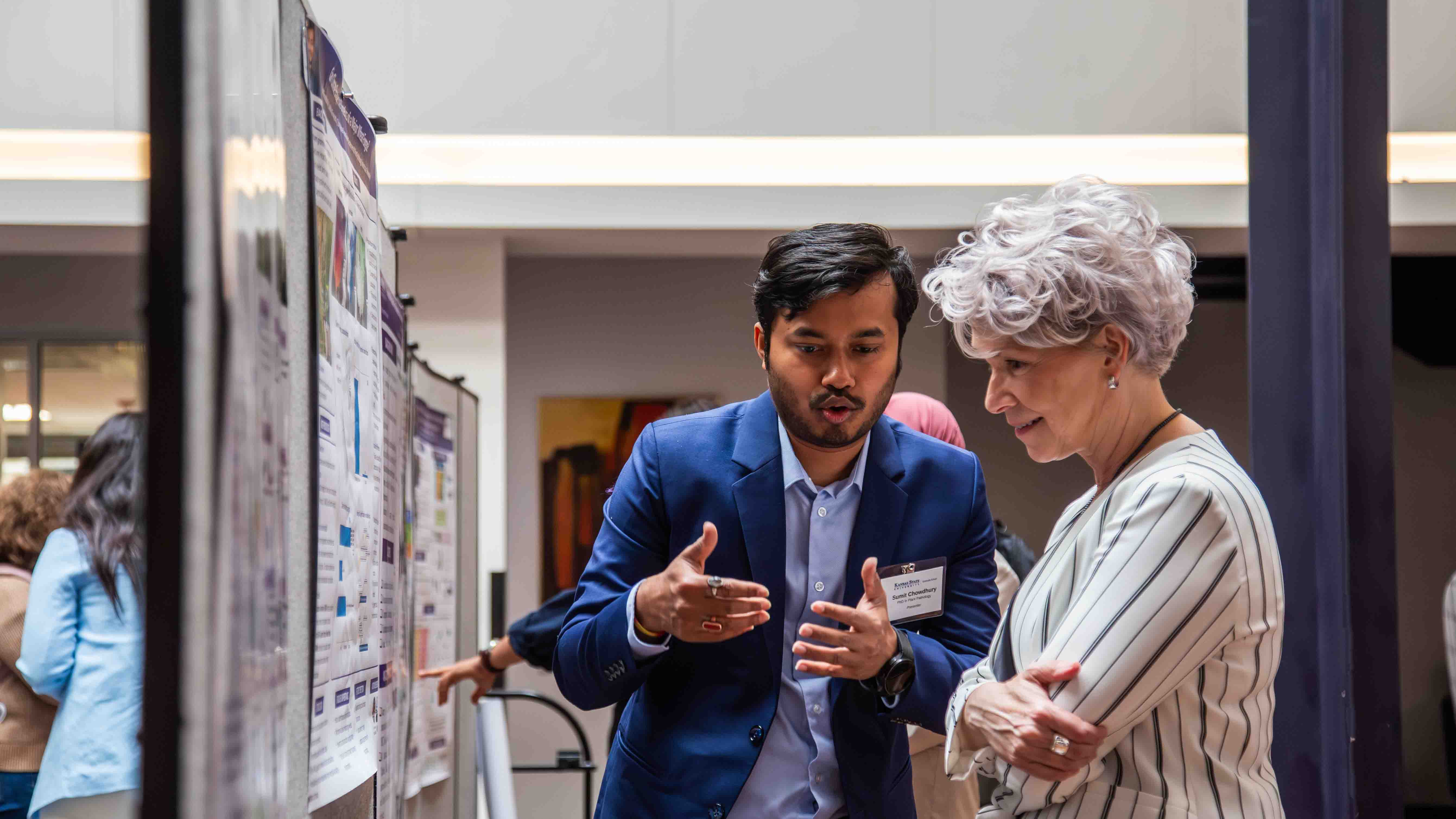 graduate student presenting research