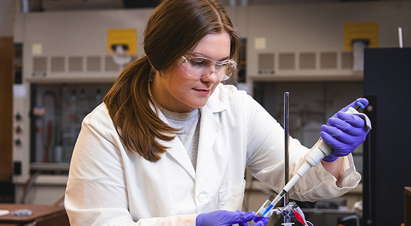 Erin pipetting in lab